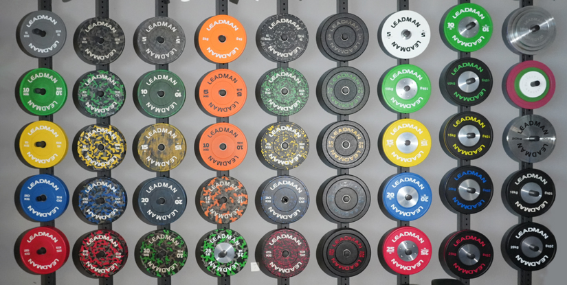 barbell and weight plates | Optimizing Gym Floor Durability(图2)